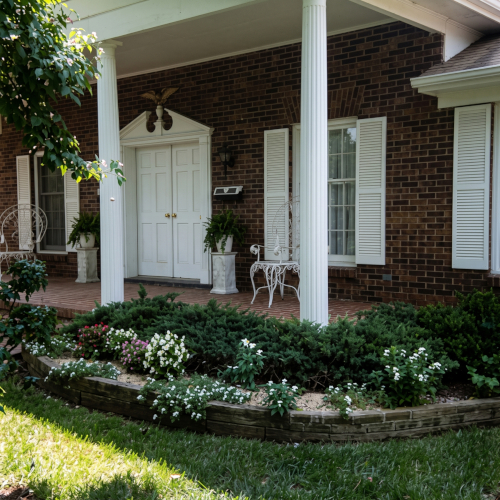 Front porch and flower bed on Marion Street